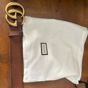 Brand new Gucci belt with gold color GG.